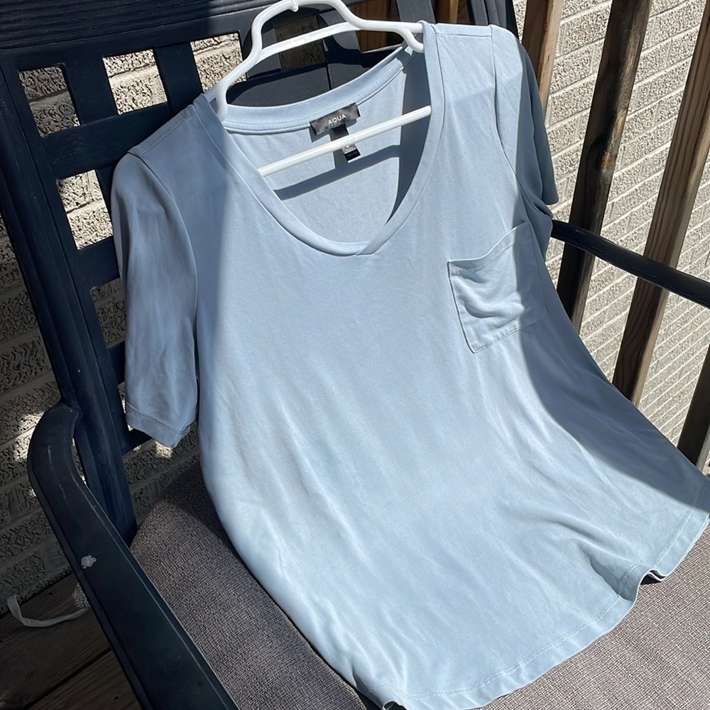 light blue SOFTEST tee b neck scoop fits size M to L EUC dusty blue